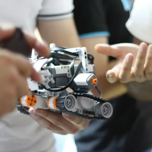 Small tank being held by a person’s hands